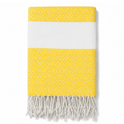 Folded yellow geometric stripe towel with white tassels