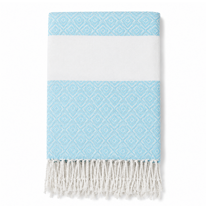 Folded pale blue geometric stripe towel with white tassels