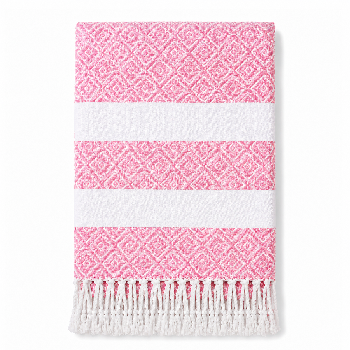 Folded pink geometric stripe towel with white tassels