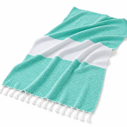 Turquoise striped hammam towel spread on a white background